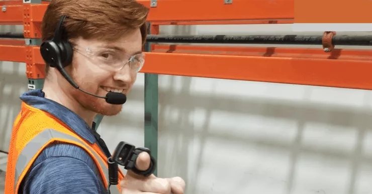 voice-picking-worker-with-headset-and-scanner