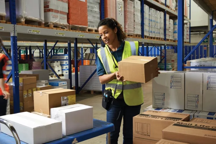 Employee using speech recognition in a warehouse